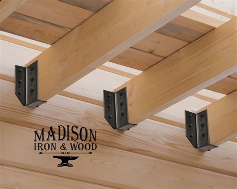 the metal brackets used to support joists are called|i joist connectors.